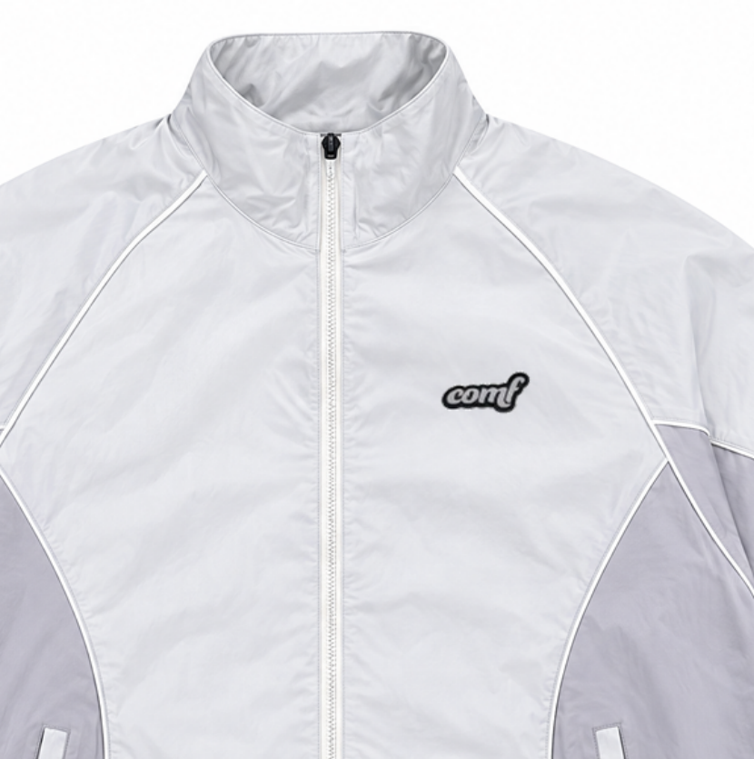 Platinum COMF track jacket collar, zipper, embroidered chest logo and piping detail